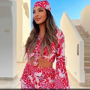 Red and White Patterned Outfit with Headscarf